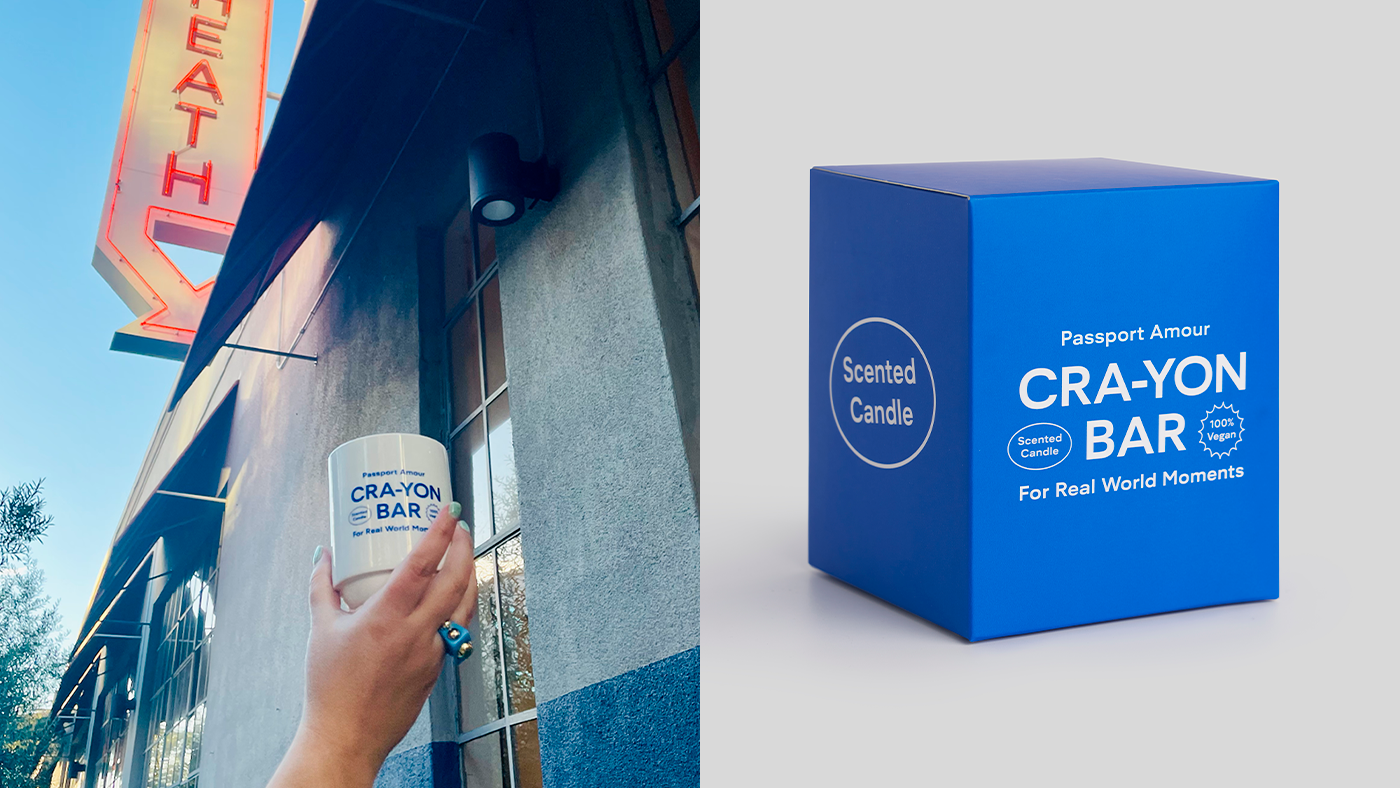 Left: Hand holding CRA-YON BAR 'Passport Amour' scented candle outdoors; Right: blue candle packaging on white background