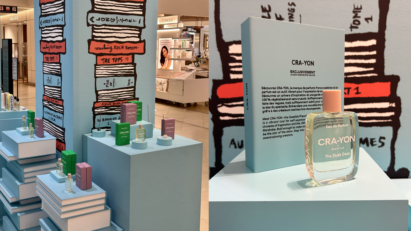 CRA-YON perfume display at Le Bon Marché featuring pastel packaging and book-themed podiums