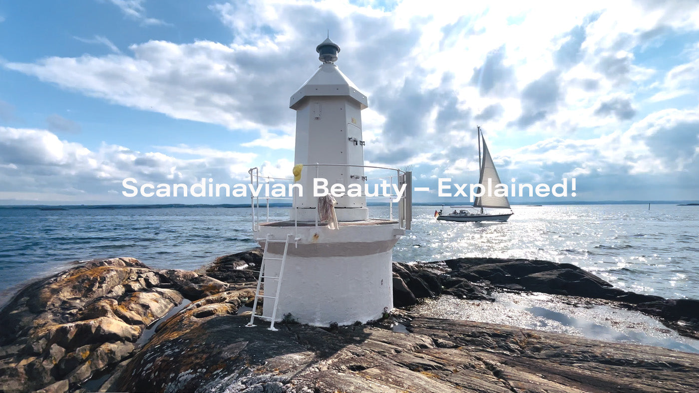 Lighthouse by the sea, sailboat in background, text about Scandinavian Beauty.