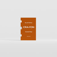 Caramel Days Eau de Parfum 2ml sample by CRA-YON in brown packaging, displayed against a light background.