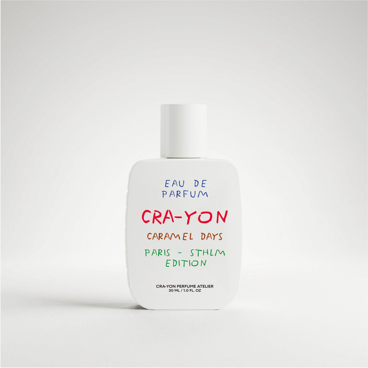 PACKSHOT OF CARAMEL DAYS LIMITED EDITION PARIS-STHLM PERFUME BOTTLE IN A STUDIO SETTING.