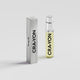 CRA-YON Young Air travel-size perfume bottle with a silver cap beside its metallic silver box on a light grey background.