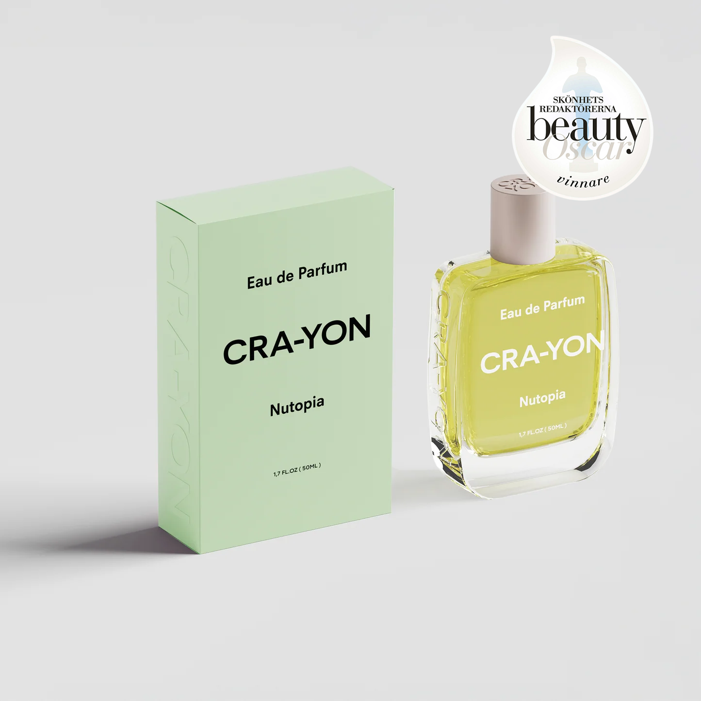 CRA-YON Nutopia Eau de Parfum bottle and pastel green box displayed beside a Beauty Oscar winner badge from Skönhetsredaktörerna.