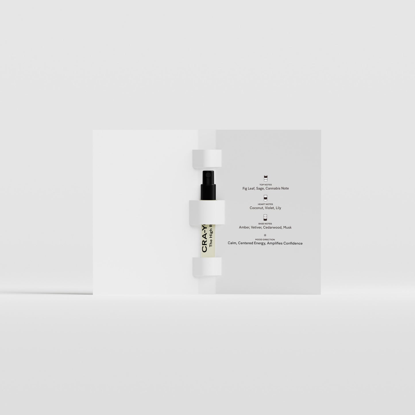 The High Road Eau de Parfum 2ml sample vial by CRA-YON, shown inside the opened white packaging with fragrance notes printed on the inner cover.