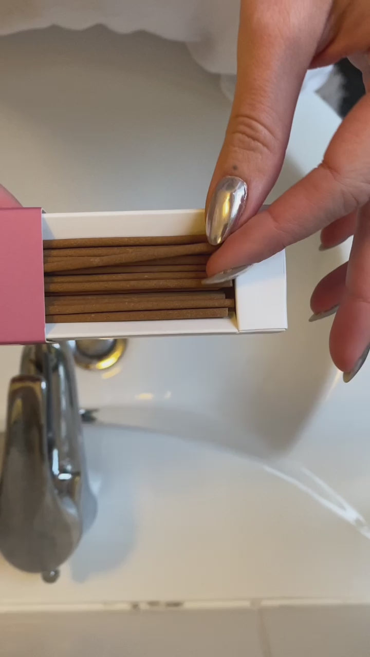 CRA-YON balancing incense in a video