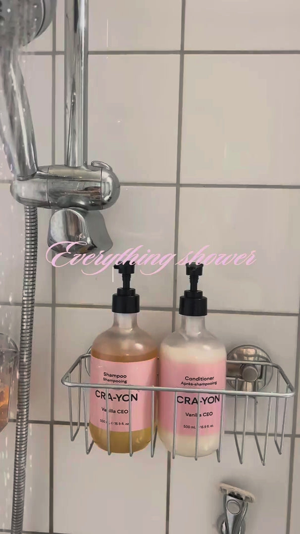 Video showing an “everything shower” routine with CRA-YON: shampoo and conditioner in the shower, layering cream applied on the skin, finishing with a woman applying the Ami Amie perfume.