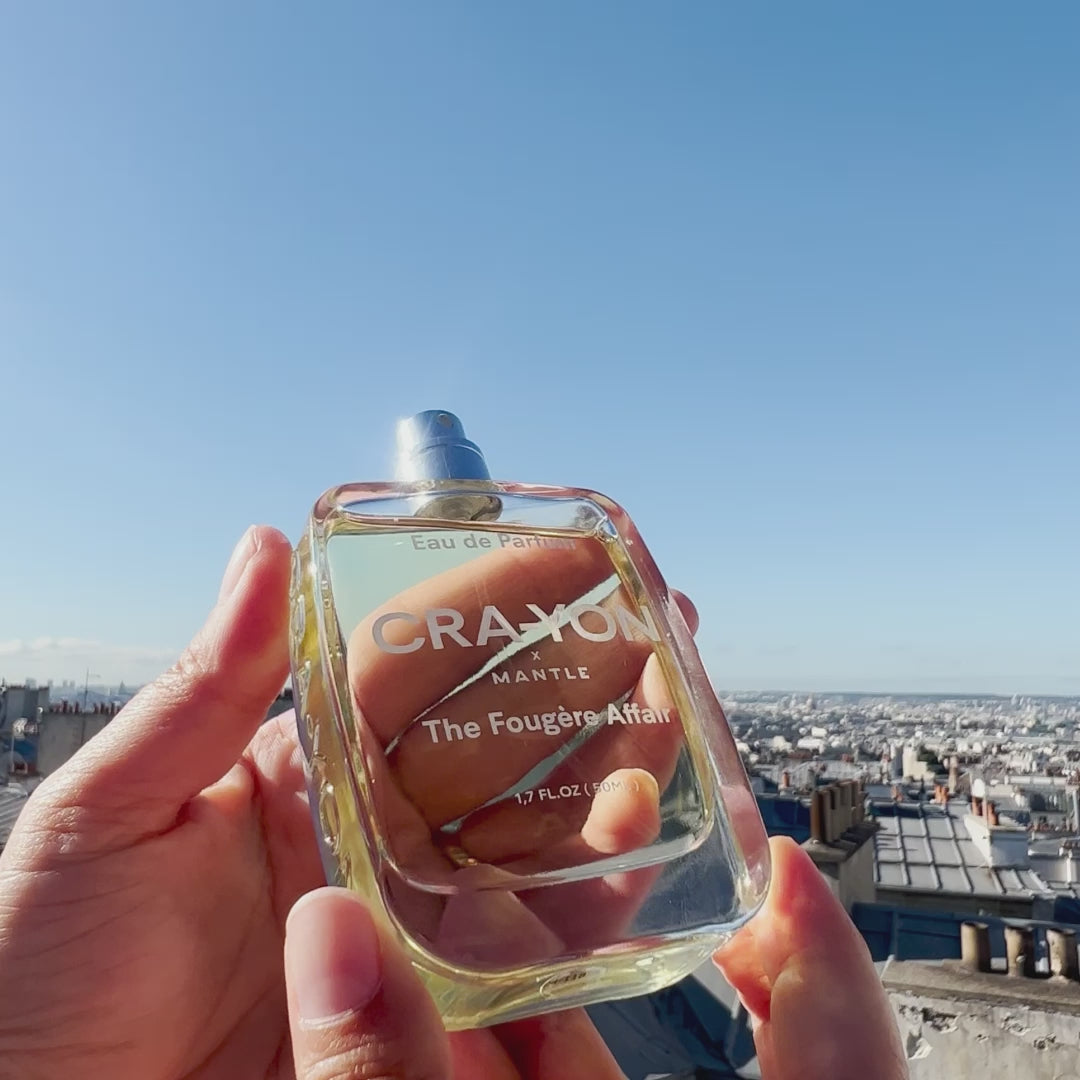 "CRA-YON x MANTLE 'The Fougère Affair' Eau de Parfum bottle sky background