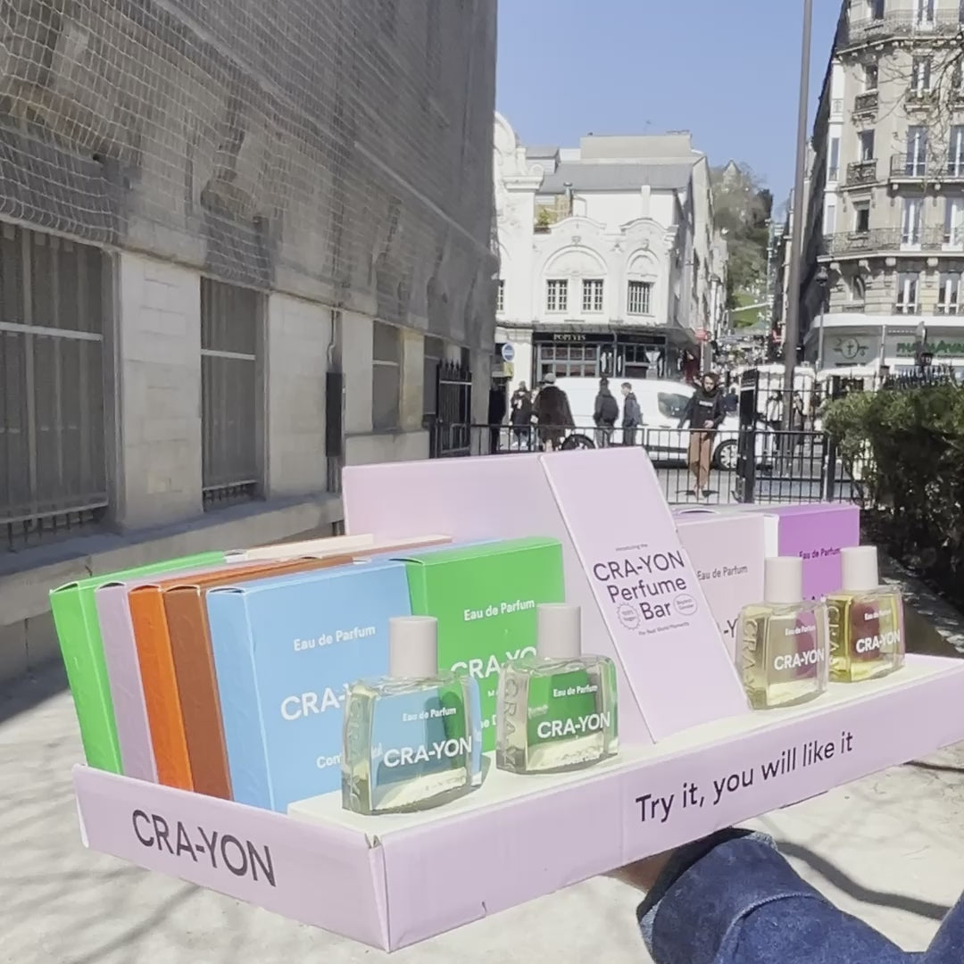 CRA-YON Display Bar – minimalist display setup with perfume testers on street