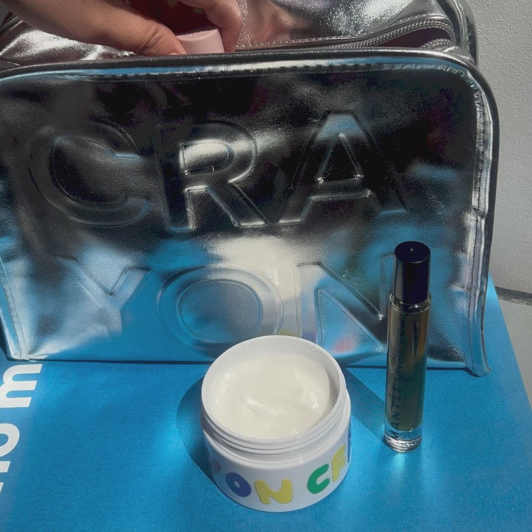 CRA-YON metallic Beauty bag with the layering cream bottle and nutopia glassbottle as well as a standing perfume oil bottle.